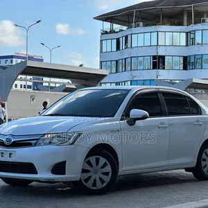 Toyota Axio 2014 Pearl Hybrid - 2