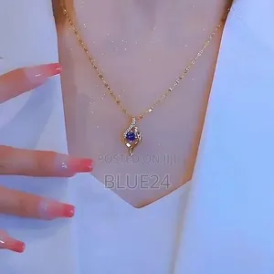 Mkufu wa Titanium Steel na Zircon ya Zambarau Umbo la Moyo - 2