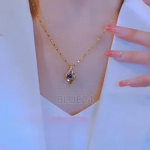 Mkufu wa Titanium Steel na Zircon ya Zambarau Umbo la Moyo - 3