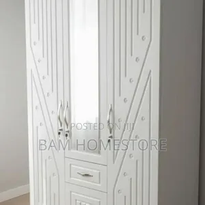 Elegant 3-Door Wardrobe with Mirror and Carved Details - 2